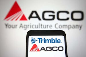 De Amerikaanse fabrikanten Agco en Trimble hebben samen het merk PTx Trimble opgericht,. Machinefabrikant Agco heeft daarvan 85% van de aandelen in handen. Gps-fabrikant Trimble heeft een aandeel van 15%. - Foto: SOPA Images/ANP